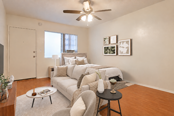 Glendale apartment for rent - A living room with a white couch and a coffee table.