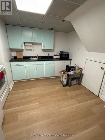 Toronto (Highland Creek) apartment for rent - A kitchen with light wood floors and white walls.