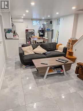 Richmond Hill (Crosby) apartment for rent - A living room with a grey couch and a coffee table.