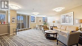 Markham (Thornhill) condo for rent - A realtor's office with a large couch and a coffee table.