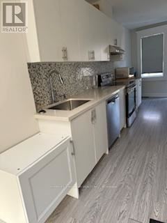 Toronto (Mount Pleasant East) apartment for rent - A kitchen with a sink and a dishwasher.