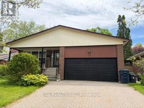 Toronto (L'amoreaux) apartment for rent - A bedroom with a bed, a dresser, and a window with curtains.