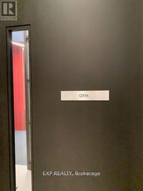 Hamilton (Beasley) condo for rent - A black door with a sign that says Gym.