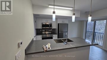 Cambridge townhouse for rent - A kitchen with a sink and a countertop.