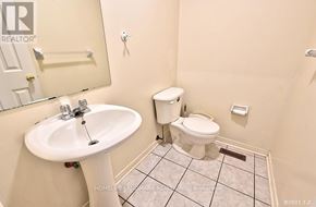 Toronto (Steeles) apartment for rent - A white sink and toilet in a small bathroom.