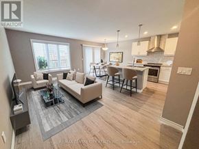 London South (South W) townhouse for rent - A living room with a grey couch and a coffee table.