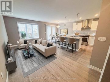 London South (South W) townhouse for rent - A living room with a grey couch and a coffee table.