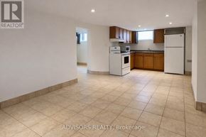 Burlington (Mountainside) apartment for rent - A kitchen area with a refrigerator, microwave, and oven.