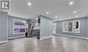 London East (East D) apartment for rent - A modern kitchen with stainless steel appliances and a refrigerator with a water dispenser.