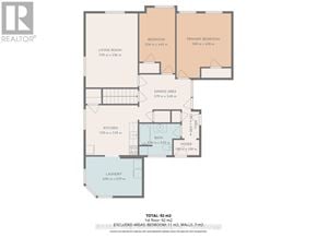 Owen Sound apartment for rent - A floor plan for a home with a living room, two bedrooms, a kitchen, a dining area, and a laundry room.