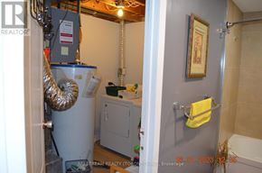 Toronto (Pleasant View) apartment for rent - A bathroom with a toilet, a sink, and a bathtub.