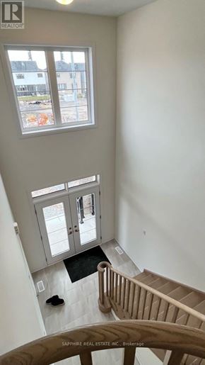 Welland (Dain City) apartment for rent - A view of a staircase leading to a balcony.