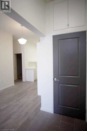 Hamilton townhouse for rent - A black door is on the right side of the image.