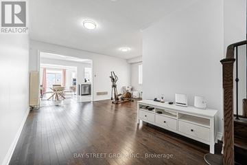 Markham (Cedarwood) apartment for rent - A spacious living room with a white sofa set and wooden flooring.