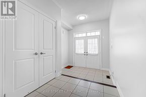 Markham (Cedarwood) apartment for rent - A white room with a door and a window.