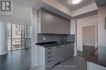 Toronto (Willowdale West) condo for rent - A kitchen with a sink and cabinets.
