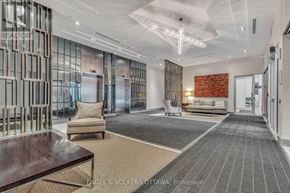 Ottawa condo for rent - A modern living room with a glass wall and a wooden coffee table.