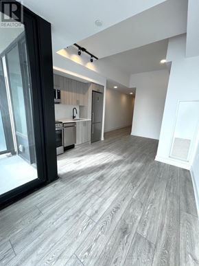 Toronto (Dovercourt-Wallace Emerson-Junction) condo for rent - A spacious kitchen with a view of the dining area.