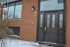 Barrie (Allandale Heights) apartment for rent - A brown door with a black handle and a number 25 on the wall above it.