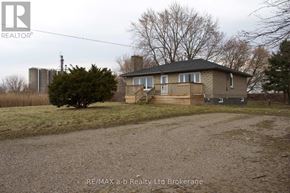 Woodstock (Woodstock - North) apartment for rent - A house with a gravel driveway in front of it.