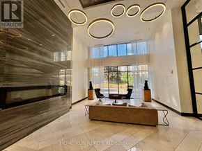 Ottawa condo for rent - A spacious living room with a fireplace and a large window.