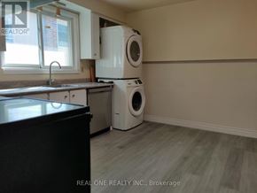 Markham (Bullock) apartment for rent - A laundry room with a washer and dryer.