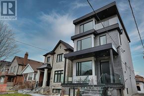 Toronto (Caledonia-Fairbank) apartment for rent - A modern house with a glass balcony is for sale.