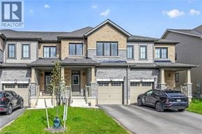 Caledonia townhouse for rent - A large, multi-level house with a car parked in front.