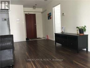 Toronto (Willowdale East) condo for rent - A room with a black desk and a chair in it.