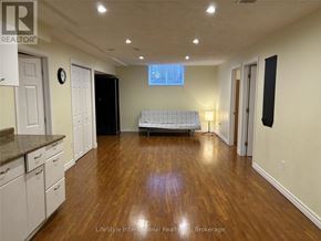 Guelph (Clairfields/Hanlon Business Park) apartment for rent - A bedroom with a bed, dresser, and mirror.