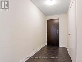 Toronto (Mount Pleasant West) condo for rent - A hallway with a door at the end.