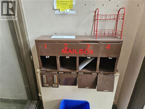 Hamilton apartment for rent - A mailbox with four compartments is labeled 1 to 4.