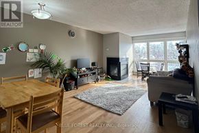 London North (North G) condo for rent - A living room with a dining table and chairs.
