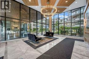 Vancouver apartment for rent - A large, modern living room with a piano and a chandelier.