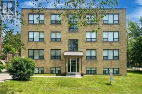 Richmond Hill (Harding) multi-family for rent - A building with a green lawn in front of it.