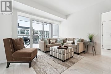 Innisfil condo for rent - A living room with a brown chair and a striped ottoman.