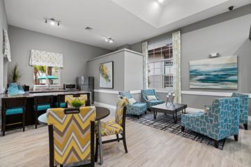 Davie apartment for rent - A living room with a dining table and chairs.