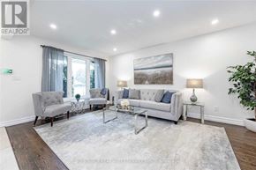 Hamilton (Westcliffe) apartment for rent - A living room with a grey couch, a grey armchair, a glass coffee table and a grey rug.