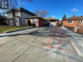 Toronto (Newtonbrook West) apartment for rent - A house with a driveway and a red outline on the ground.