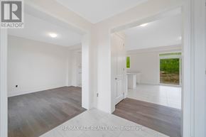 Otonabee-South Monaghan apartment for rent - A spacious room with a white door and a window.