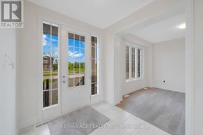 Otonabee-South Monaghan apartment for rent - A real estate listing photo of a white room with a sliding glass door.