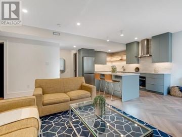 Mississauga (Cooksville) apartment for rent - A living room with a glass coffee table and a couch.