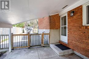 London North (North K) apartment for rent - A snow-covered backyard with a wooden fence and a tree.