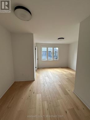 Toronto (Lansing-Westgate) apartment for rent - A room with wooden flooring and a window.