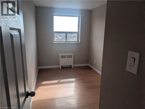 Hamilton condo for rent - Source URL: https://ddfcdn.realtor.ca/listing/TS639112559430600000/reb14/highres/5/40818735_5.jpg