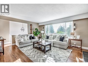 North Vancouver apartment for rent - A living room with a grey sofa and a coffee table.
