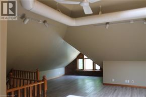 Grimsby apartment for rent - A room with a ceiling fan and a window.