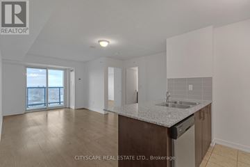 Toronto (Dovercourt-Wallace Emerson-Junction) condo for rent - A kitchen area with a sink and a dishwasher.