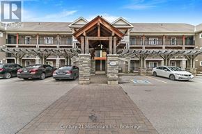 Collingwood condo for rent - A building with a sign that says Century 21 Millennium Inc., Brokerage.