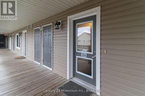 Collingwood condo for rent - A realtor photo of a house with the number 304 on it.